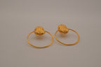 Artisanal gold hoop earring