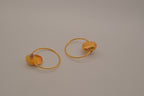 Artisanal gold hoop earring
