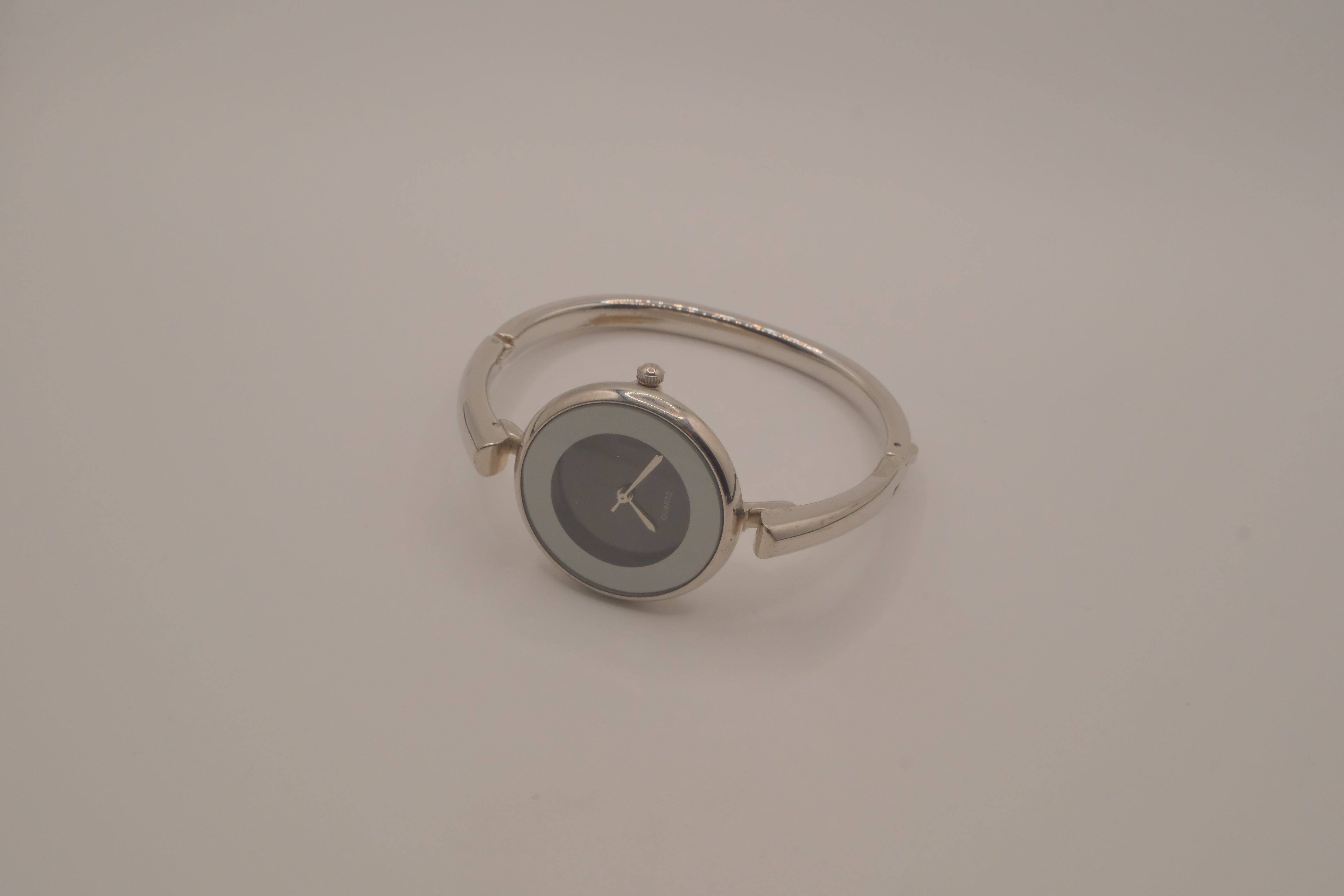 Sleek bezel frame bangle bracelet watch