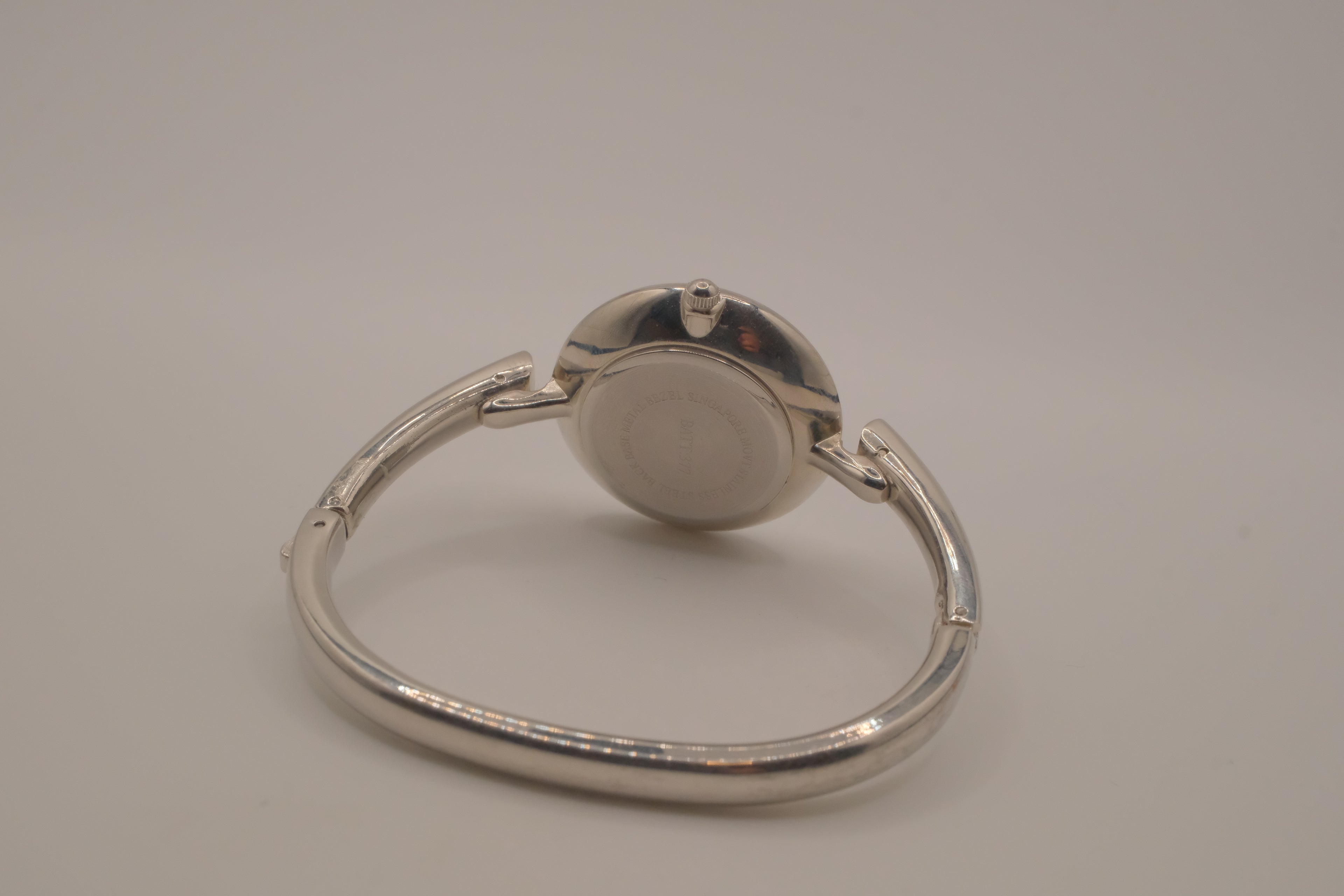 Sleek bezel frame bangle bracelet watch
