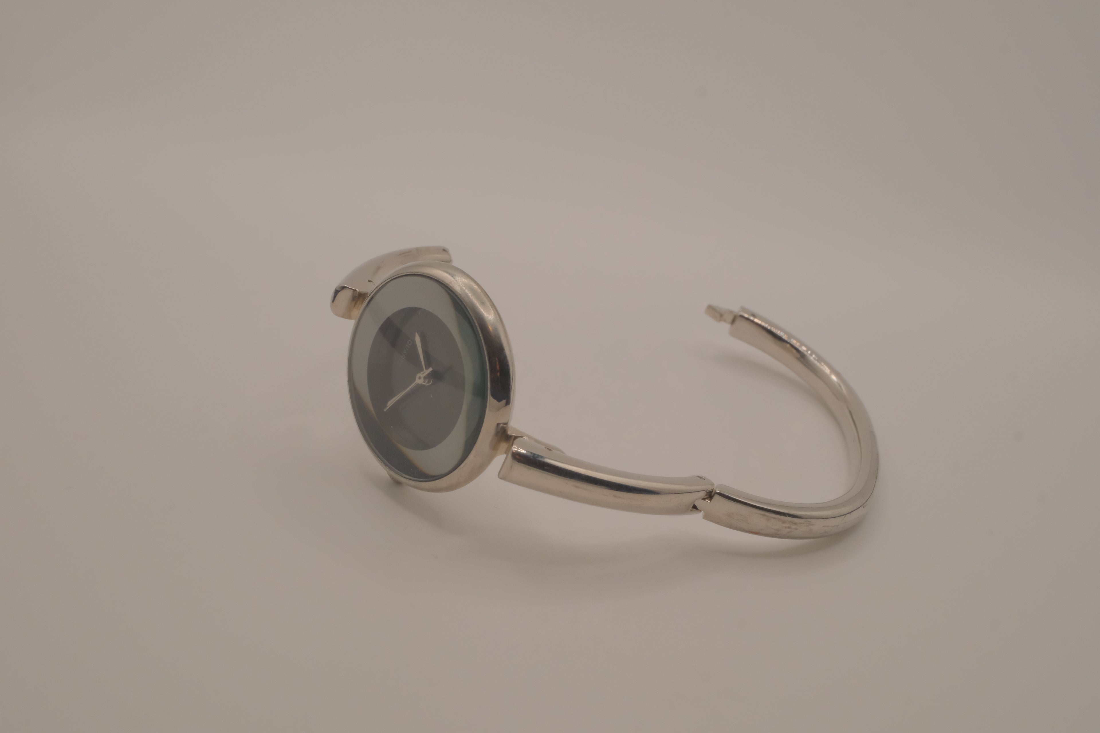 Sleek bezel frame bangle bracelet watch