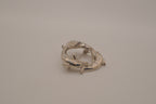 Vintage silver dolphin circle brooch