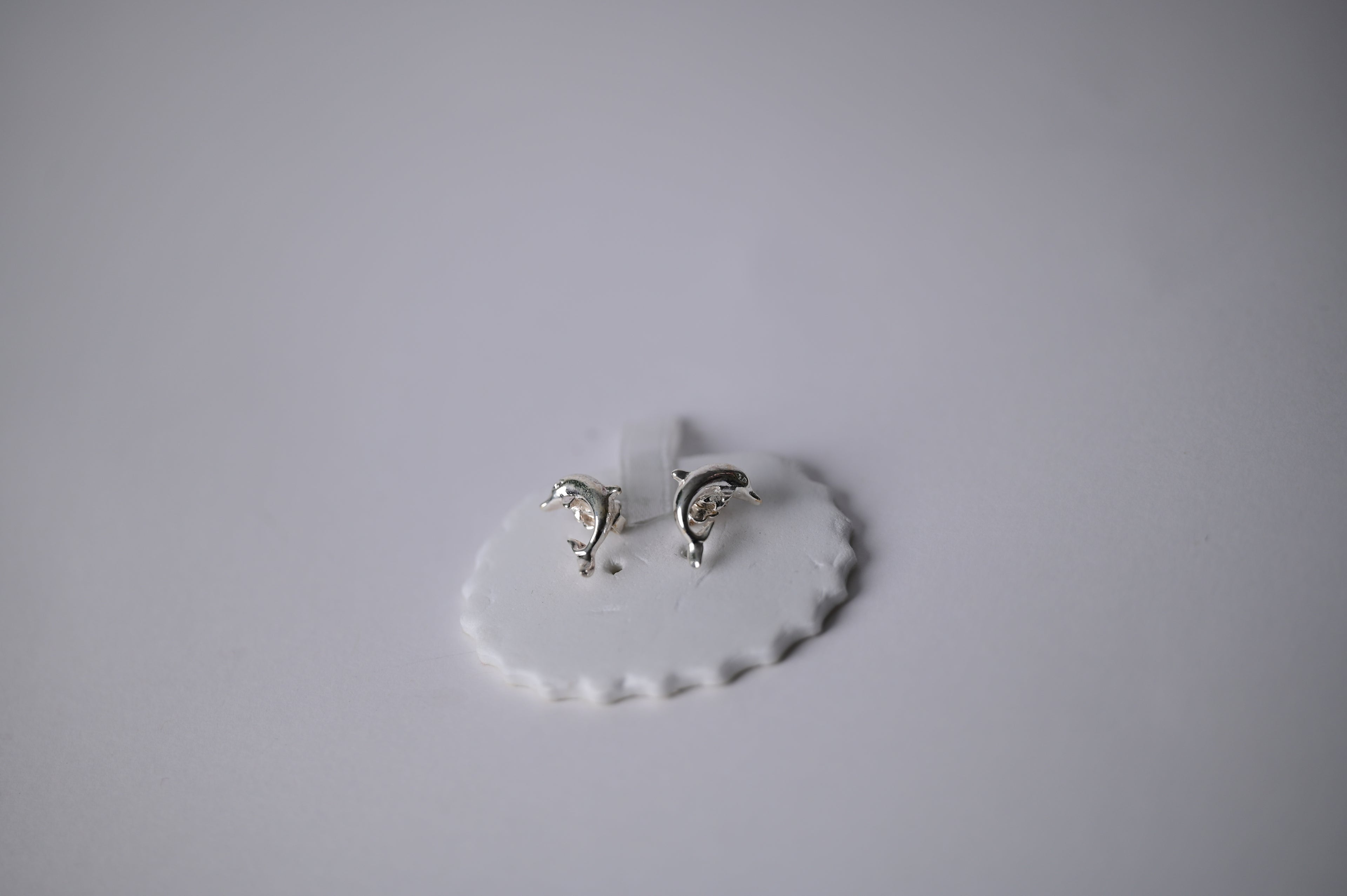 Vintage Avon dolphin studs